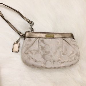 COACH monogram clutch / wristlet